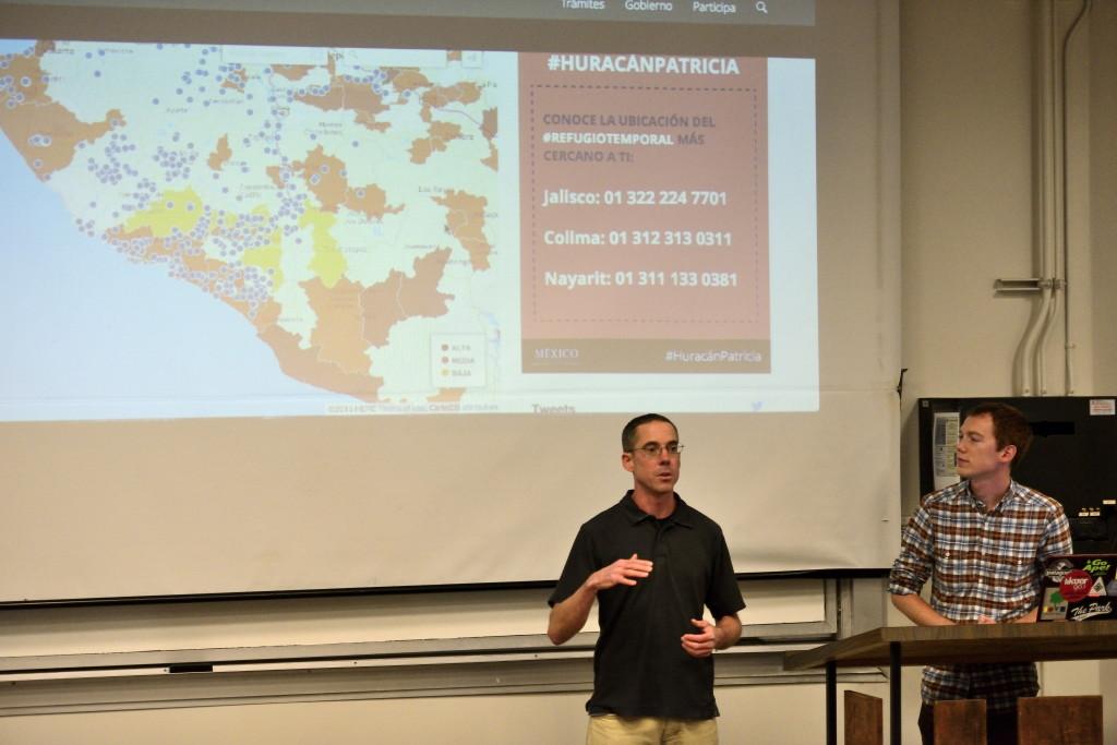 Seth Bishop, Graduate student in the Geography Department, and Tim Edgar, Doctoral candidate in the Geography Department, explain to students how to use the OpenStreetMaps to help map the Hurricane damaged region in Mexico in OSH on Monday, Oct. 26, 2015