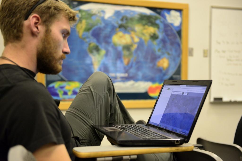 Cody Saylar, Junior in Mechanical Engineering, uses OpenStreetMaps to help map the Hurricane damaged region in Mexico in OSH on Monday, Oct. 26, 2015