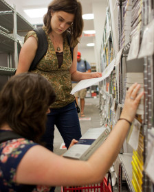 Sisters Christina Triptow, Senior in Communications, and Nicole Triptow, Senior in English teaching, search for textbooks at the U bookstore, Monday, August 24, 2015.