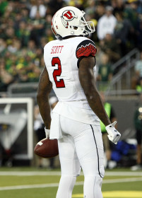 Utah receiver Kenneth Scott (2) looks to the Utah fan section after scoring a touchdown against the Oregon Ducks in Pac-12 play at Autzen Stadium in Eugene, Ore., Saturday, Sept. 26, 2015.