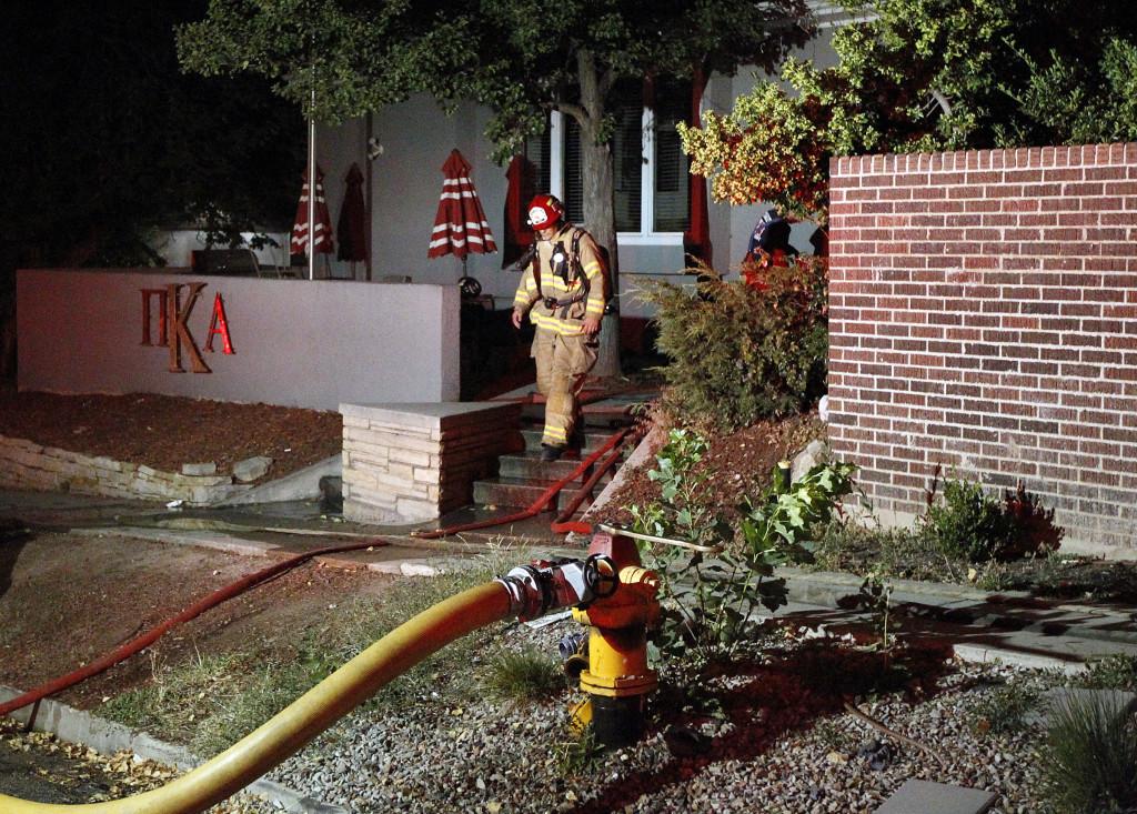 Fire crews respond to a call at the Pi Kappa Alpha fraternity house at the University of Utah, Friday, July 3, 2015. Fires were reported at two fraternity houses early morning Friday.