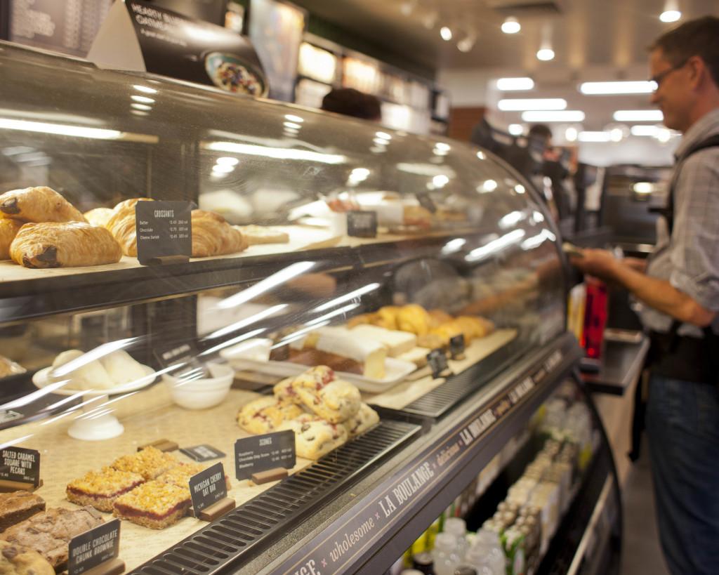 A student orders a drink at the new Starbucks in the University campus store, Monday, September 14, 2015.