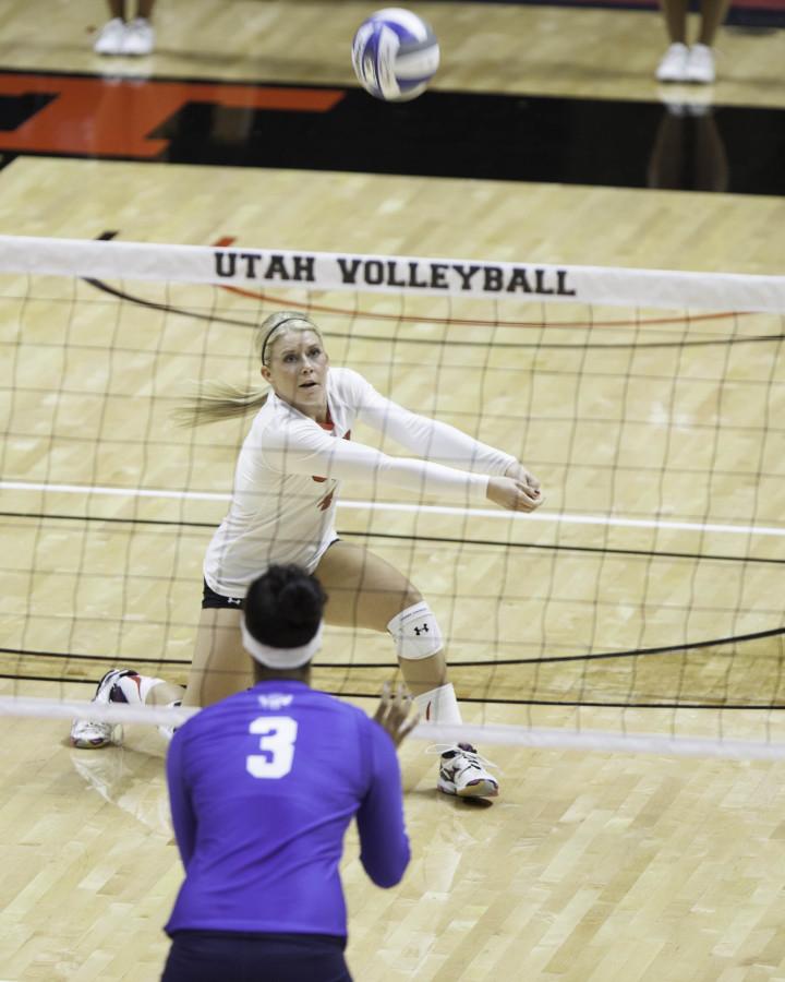 Tess Sutton(4) hits the ball at the Utah BYU volleyball game,Thursday September 17, 2015.