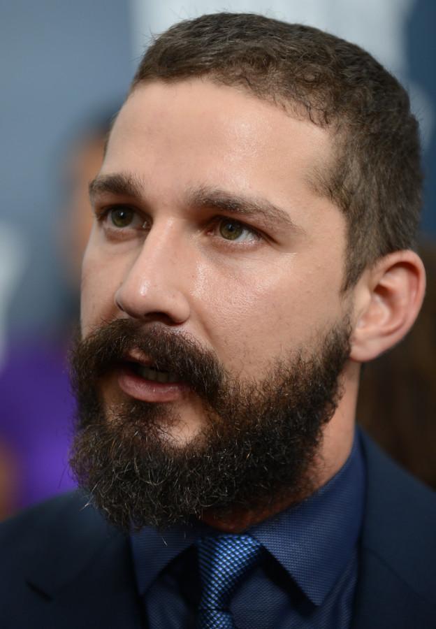 Actor Shia Labeouf, who plays the part of “Bible/Boyd Swan”, gives interviews with the media on the “Red Carpet” during the world premiere of the movie Fury at the Newseum in Washington D.C.  (Department of Defense photo by Marvin Lynchard)