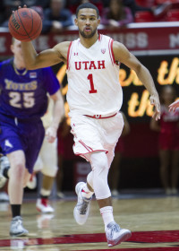 Runnin' Utes sophmore guard Isaiah Wright (1) drives the ball at the Utah vs College of Idaho mens basketball game, Monday December 28, 2015.