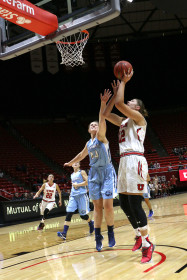 Sophomore Emily Potter (12) scores against Fort Louis in an exhibition game at the Huntsman center on 6 Nov 2015.