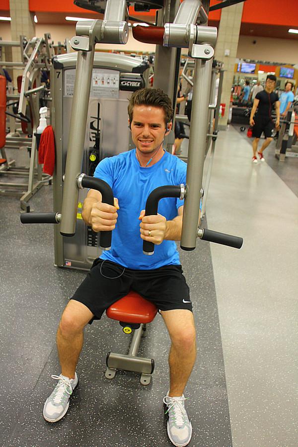 Brandon Hays, a junior in exercise and sports science pre med, works out at the Student Life Center on Wednesday night. Photo credit: Dane Goodwin
