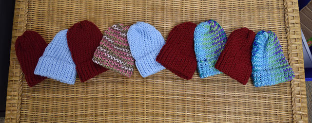 Facilities Management Employees Knit Hats For Charity