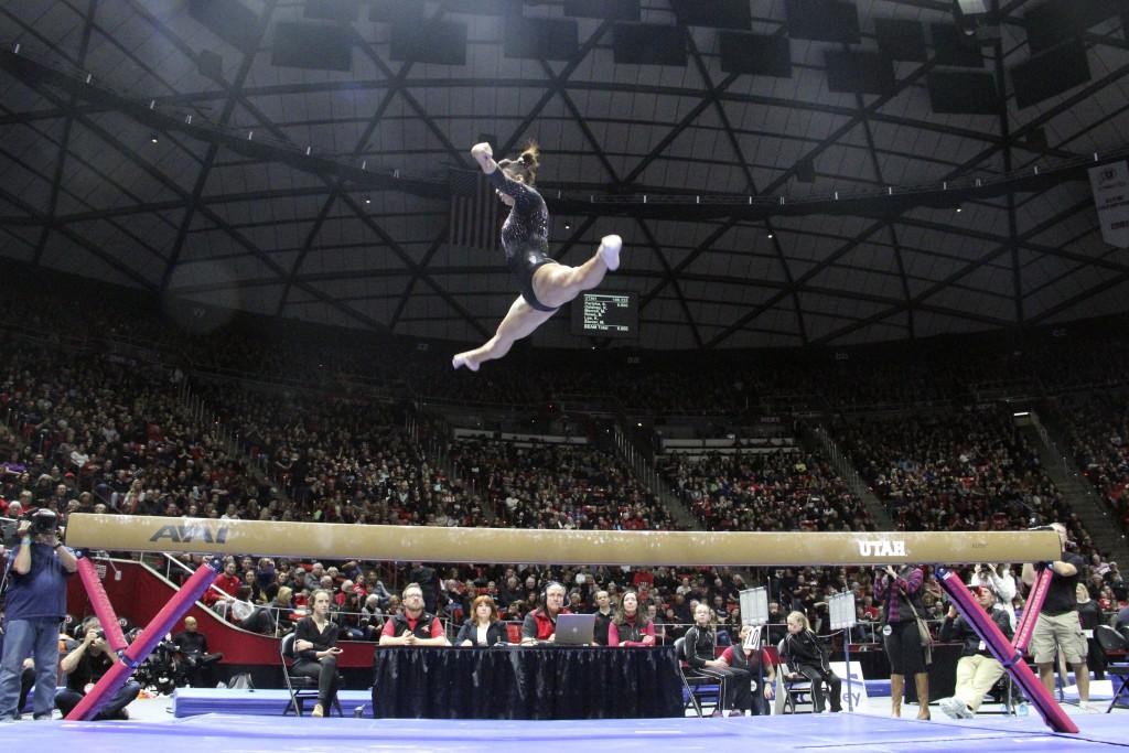 Junior Baely Rowe performs her beam routine during the Utah v Oregon State gymnastics meet at the Jon M. Huntsman Center, Saturday, Jan. 23, 2016. The Red Rocks won the meet 196.125-195.125. (Madeline Rencher, Daily Utah Chronicle)