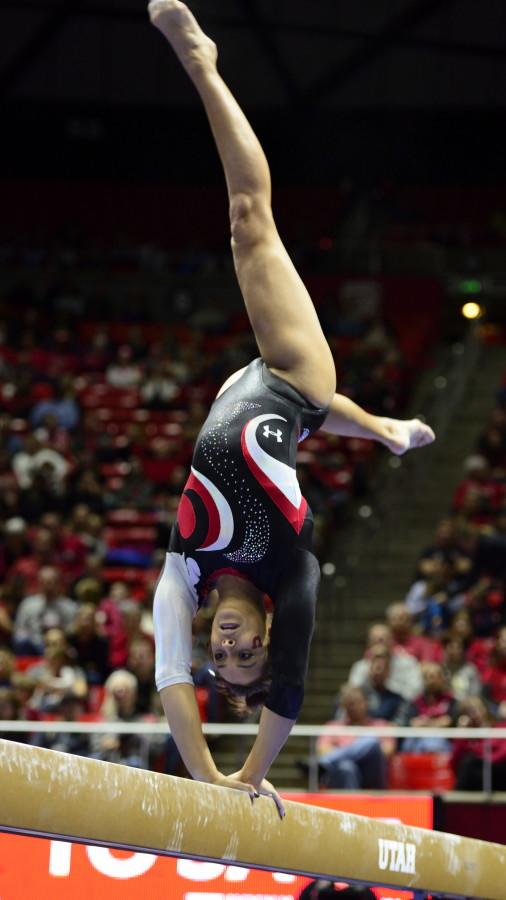 Utah senior Kailah Delaney performs during her beam routine in a meet against the Arizona Wildcats at the Jon M. Huntsman Center on Monday, Feb. 1, 2016. (Kiffer Creveling, Daily Utah Chronicle)