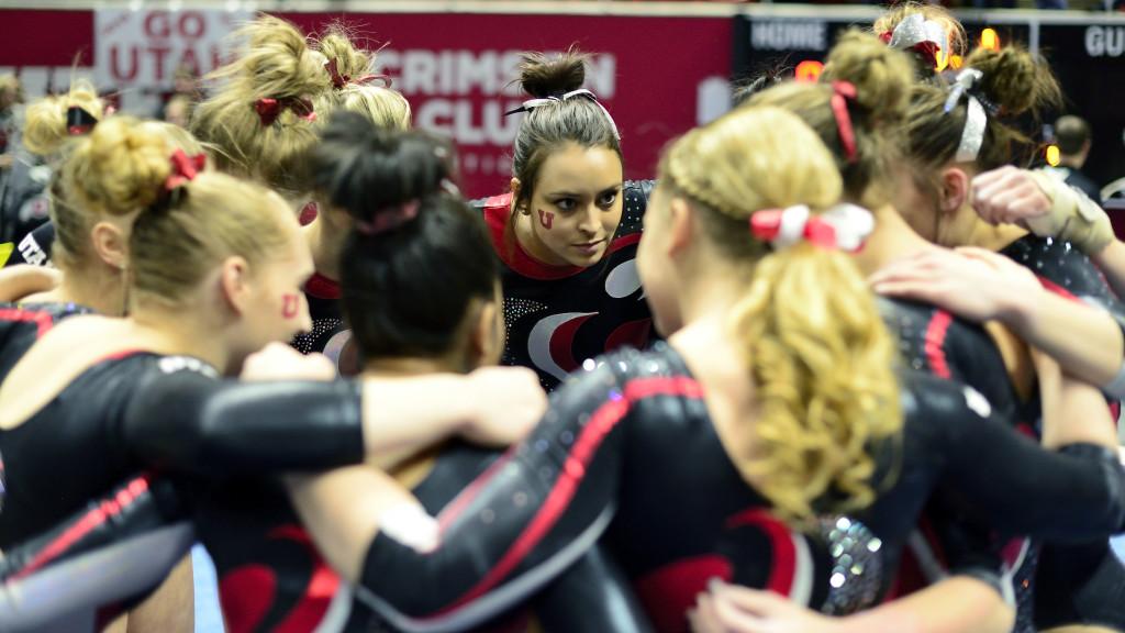 Senior Kailah Delaney listens to her teammates during a huddle in a meet against the Arizona Wildcats at the Jon M. Huntsman Center on Monday, Feb. 1, 2016. (Kiffer Creveling, Daily Utah Chronicle). The Red Rocks improved to 4-0 with a 197.150-194.850 win.
