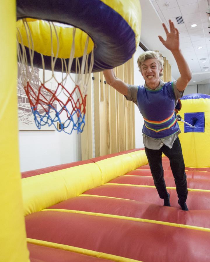 A student participates in an inflatable basketball game at Crimson Nights Winter Wonderland at the Union, Friday Feb. 5, 2016. (Mike Sheehan, Daily Utah Chronicle)