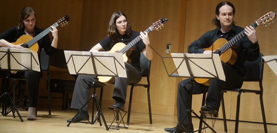 Emily Hackworth, Alyssa Jorgensen, and Austin Gren perform at the U Classical Guitar Ensembles in Dumke Recital Hall on Thursday, April 21, 2016. (Rishi Deka, Daily Utah Chronicle)