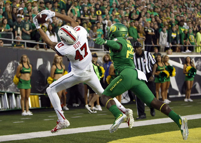 Utah tight end Caleb Repp (47) catches a pass in the end zone in the first half against the Oregon Ducks in a Pac-12 game at Autzen Stadium in Eugene, Ore., Saturday, Sept. 26, 2015.