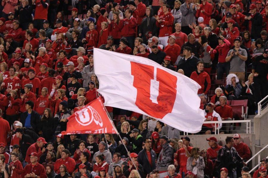 Fans wave flags around the stadium in a Pac-12 football game against the Arizona State Sun Devils at Rice-Eccles Stadium in Salt Lake City, Saturday, Oct. 17, 2015. Madeline Rencher, Daily Utah Chronicle. Photo credit: Madeline Rencher