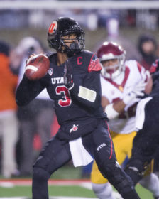 University of Utah Football junior quarterback Troy Williams (3) looks downfield to pass the ball during the game vs. the University of Southern California Trojans at Rice-Eccles Stadium on Friday, September 23, 2016