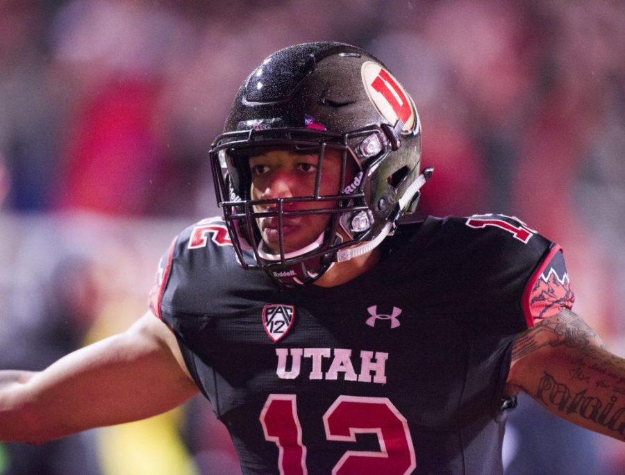 University+of+Utah+Football+senior+wide+reciever+Tim+Patrick+%2812%29+celebrates+after+making+the+game+winning+touchdown+catch+during+the+game+vs.+the+University+of+Southern+California+Trojans+at+Rice-Eccles+Stadium+on+Friday%2C+September+23%2C+2016