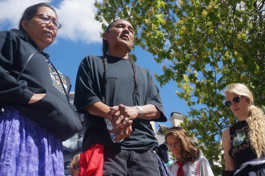 Navajo activists lead a prayer at the end of The Utah Peoples Climate March in front of the Governors Mansion in Salt Lake City, Utah on Saturday, Apr. 29, 2017. (Photo by Rishi Deka | Daily Utah Chronicle)