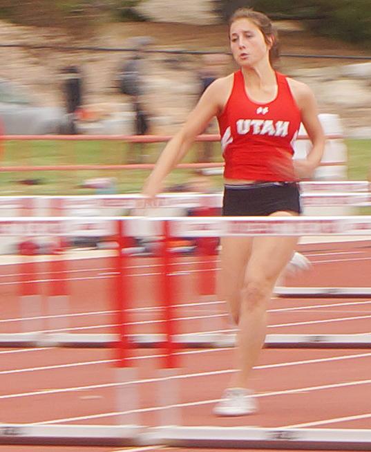 Holly Stallman jumps hurdles during the Utah Spring Classic vs. Weber State at McCarthey Family Track and Field in Salt Lake City, Utah in Salt Lake City, Utah on Friday, April 7, 2017. (Rishi Deka, Daily Utah Chronicle)