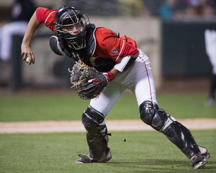 The University of Utah Mens Baseball team sophomore catcher Zack Moeller (28) picks up a bunt to the runner out in a Pac-12 game vs. the USC Trojans at Smiths Ballpark on Monday, May 15, 2017

(Photo by Kiffer Creveling | The Daily Utah Chronicle)