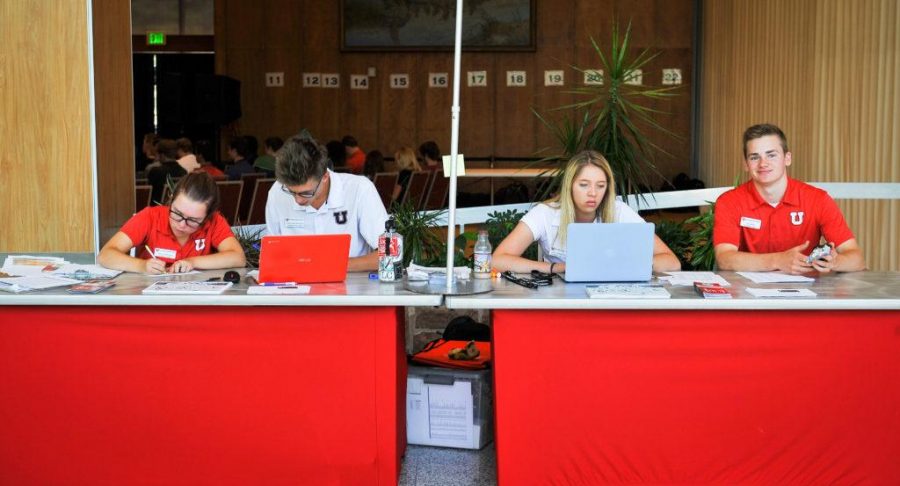 From left to right Anna Thomas, Simon Greenhalgh, Amy Tetreault and Justin Rein man the help desk for the new student orientation session in the Ray A. Olpin Student Union on the University of Utah Campus, Salt Lake City, UT on Thursday, July 13, 2017

(Photo by Adam Fondren | Daily Utah Chronicle)