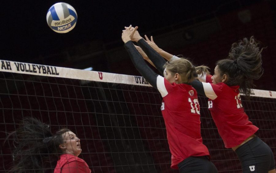 Carly Trueman (10) and Phoebe Grace (19) block the ball during the Utah Womens Volleyball Red vs. White Scrimmage at the U Hunstman Center in Salt Lake City, Utah on Saturday, Aug. 19, 2017. (Dr. Rishi Deka  | Daily Utah Chronicle)