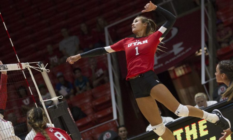 Dani Barton (1) jumps in an attempt to hit the ball during the Utah Womens Volleyball Red vs. White Scrimmage at the U Hunstman Center in Salt Lake City, Utah on Saturday, Aug. 19, 2017. (Dr. Rishi Deka  | Daily Utah Chronicle)