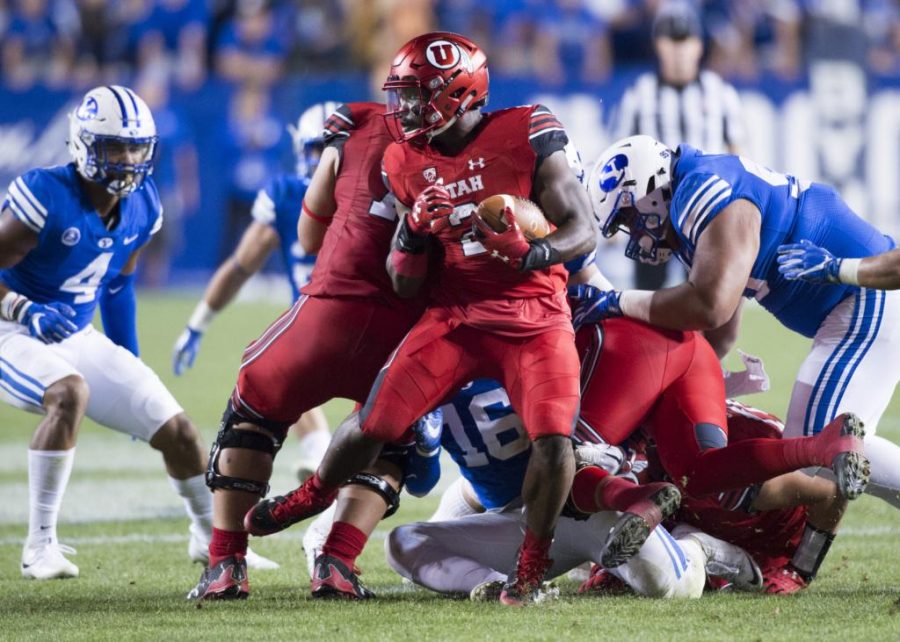 University of Utah sophomore running back Zack Moss (2) looks for an open route to run the ball in an NCAA football game vs. The Brigham Young University Cougars at LaVell Edwards Stadium in Provo, Utah on Saturday, Sept. 9, 2017

(Photo by Kiffer Creveling | The Daily Utah Chronicle)