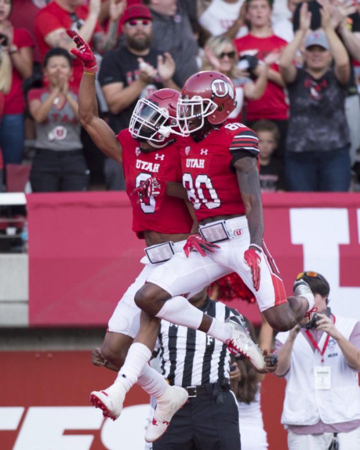 The University of Utah senior wide receiver Darren Carrington II (9) (left) celebrates with sophomore wide receiver Siaosi Wilson (80) (right) after a touchdown in an NCAA football game vs. The North Dakota Hawks at Rice Eccles Stadium on Thursday, Aug. 31, 2017

(Photo by Kiffer Creveling | The Daily Utah Chronicle)