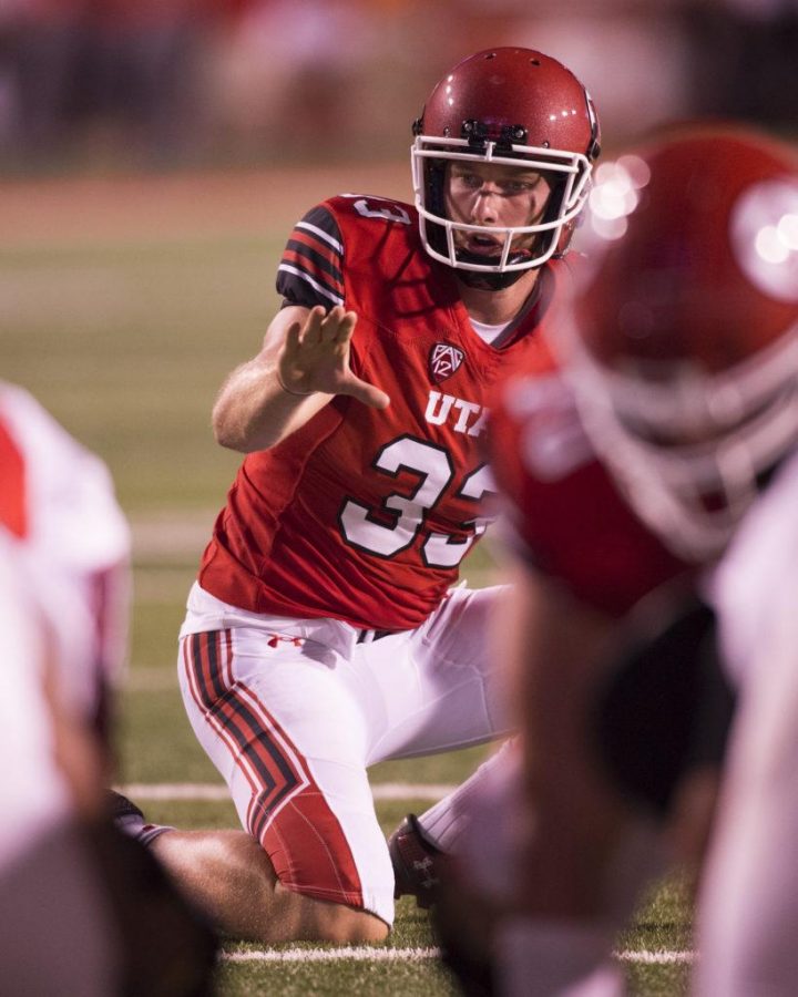 The University of Utah junior punter Mitch Wishnowsky (33) receives the snap after the touchdown by sophomore quarterback Tyler Huntley (1) in an NCAA football game vs. The North Dakota Hawks at Rice Eccles Stadium on Thursday, Aug. 31, 2017

(Photo by Kiffer Creveling | The Daily Utah Chronicle)