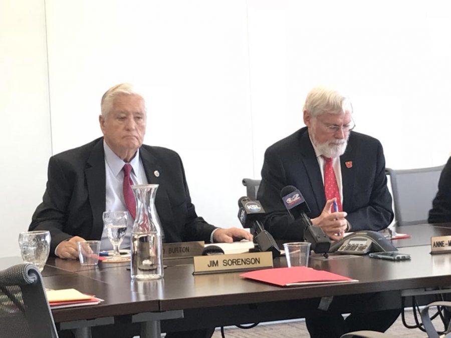 University of Utah Board of Trustees Chair H. David Burton and President David Pershing at an October 5, 2017 meeting, discussing a new memorandum of understanding with Huntsman Cancer Foundation over the operation of the Huntsman Cancer Institute.