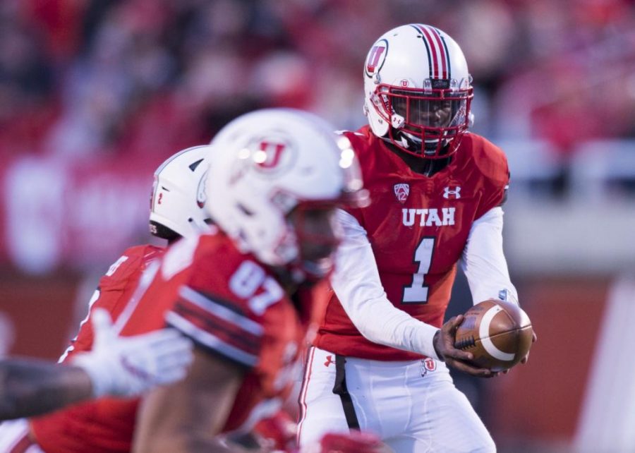 University of Utah sophomore quarterback Tyler Huntley (1) holds the ball before the handoff to sophomore running back Zack Moss (2) in an NCAA Football game vs. The Washington State Cougars in Rice Eccles Stadium in Salt Lake City, Utah on Saturday, Nov. 11, 2017

(Photo by Kiffer Creveling | The Daily Utah Chronicle)