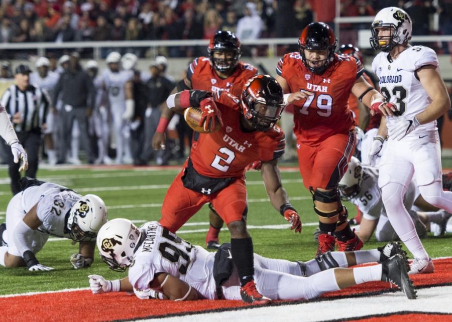 University of Utah sophomore running back Zack Moss (2) scores a touchdown in an NCAA Football game vs. The University of Colorado Buffs at Rice Eccles Stadium in Salt Lake City, Utah on Saturday, Nov. 25, 2017

(Photo by Kiffer Creveling | The Daily Utah Chronicle)