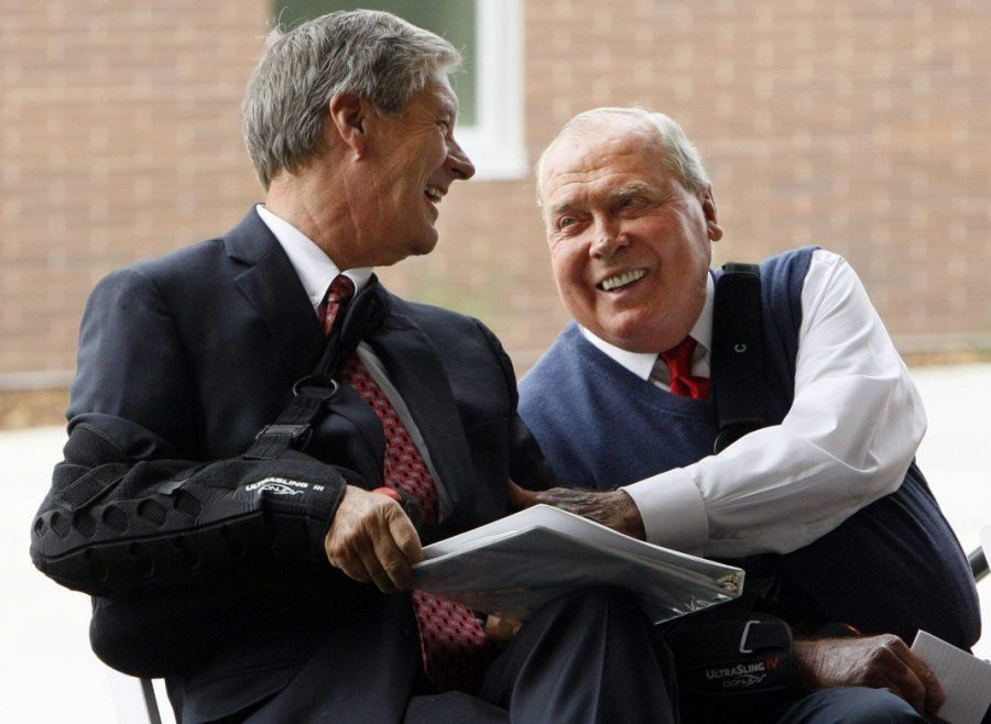 U athletic director Dr. Chris Hill, left, shares a laugh with Jon M. Huntsman at the ribbon cutting ceremony of the Jon M. and Karen Huntsman Basketball Facility, Thursday, Oct. 1, 2015.