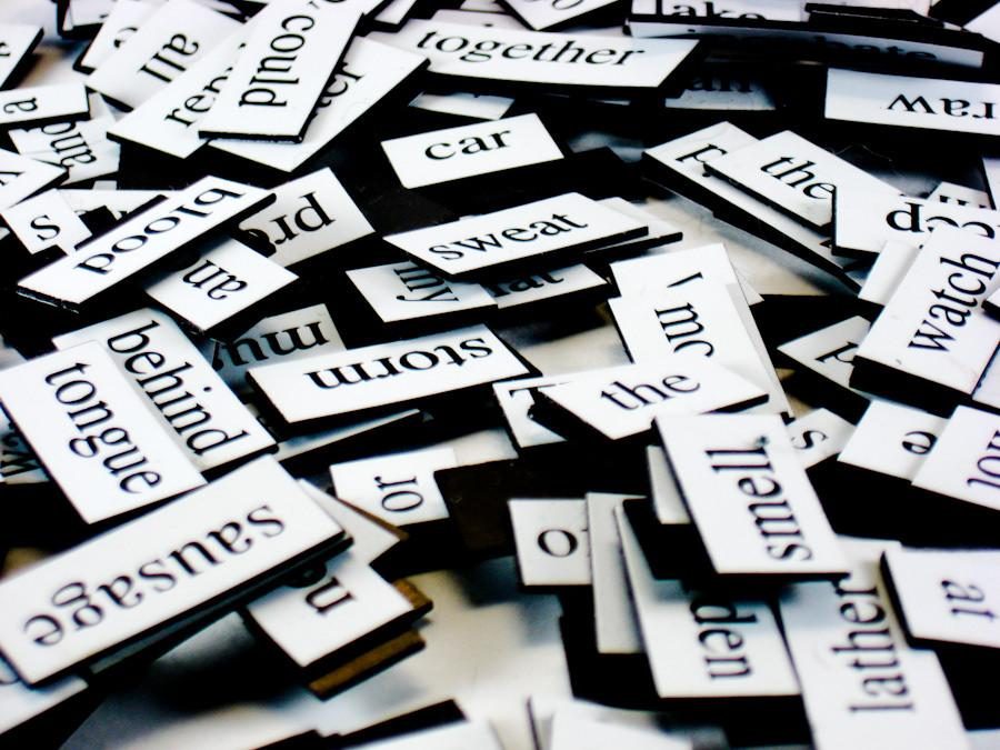 A collection of fridge poetry magnets
