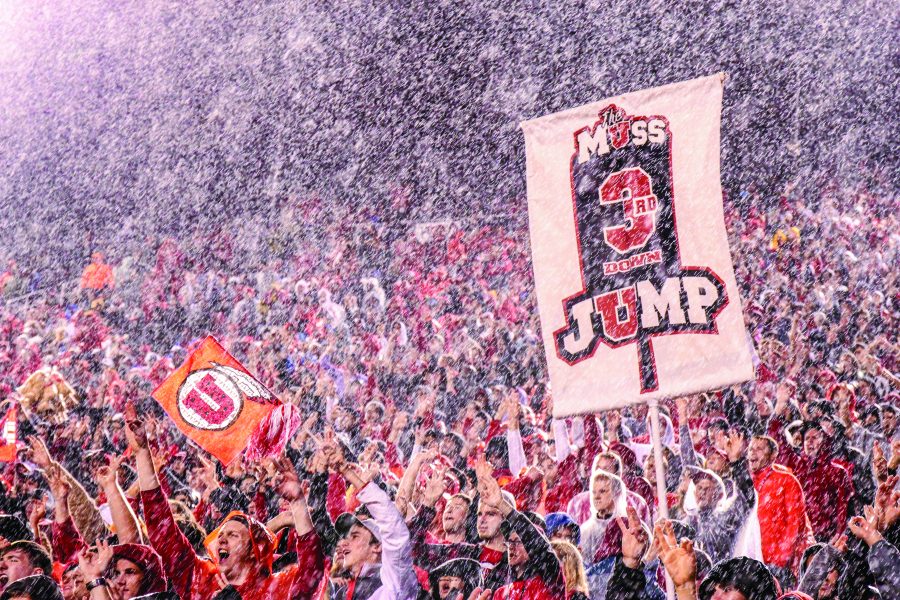 Members of the MUSS participate in the third down jump amidst the rain in a Pac-12 football game against the Arizona State Sun Devils at Rice-Eccles Stadium in Salt Lake City, Saturday, Oct. 17, 2015. Madeline Rencher, Daily Utah Chronicle.