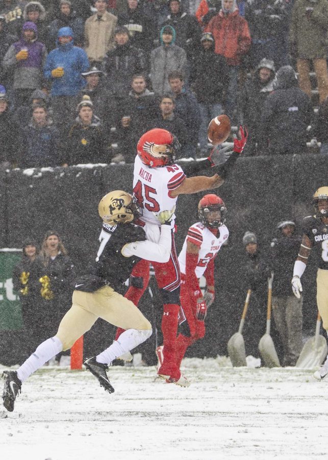 University of Utah sophomore wide receiver Samson Nacua (45) brings down a pass from QB Jason Shelley (15) to put six on the board for the Utes at Folsom Field in Boulder, CO Saturday, Nov. 17, 2018. 

(Photo by: Justin Prather | The Utah Chronicle).