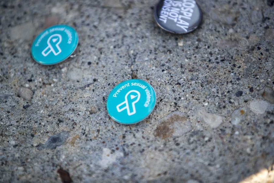 Buttons showing support for sexual assault victims during the sexual assault protest in the MEB parking lot on Friday, Nov 4, 2016. (Photo by Chris Ayers | Daily Utah Chronicle)