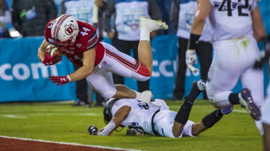 University of Utah junior tight end Jake Jackson (44) scores a touchdown over Northwestern University defense during the San Diego County Credit Union Holiday Bowl at SDCCU Stadium in San Diego, California on Monday, Dec. 31, 2018. (Photo by Kiffer Creveling | The Daily Utah Chronicle)
