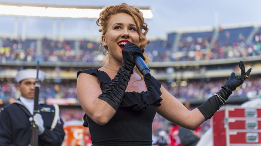 Haley Reinhart sings the national anthem during the San Diego County Credit Union Holiday Bowl at SDCCU Stadium in San Diego, California on Monday, Dec. 31, 2018. (Photo by Kiffer Creveling | The Daily Utah Chronicle)