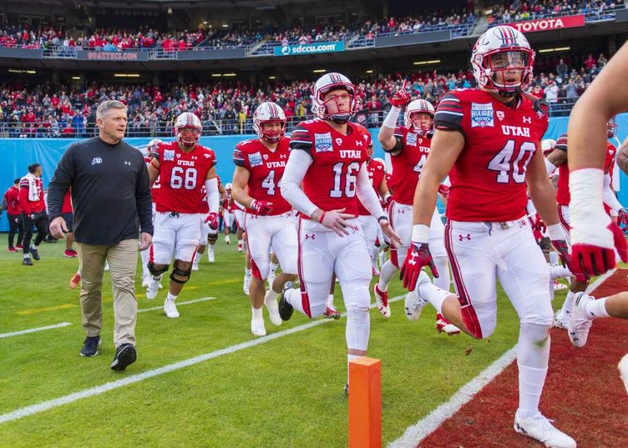 The University of Utah football team runs onto the field before the San Diego County Credit Union Holiday Bowl vs. Northwestern University at SDCCU Stadium in San Diego, California on Monday, Dec. 31, 2018. (Photo by Kiffer Creveling | The Daily Utah Chronicle)