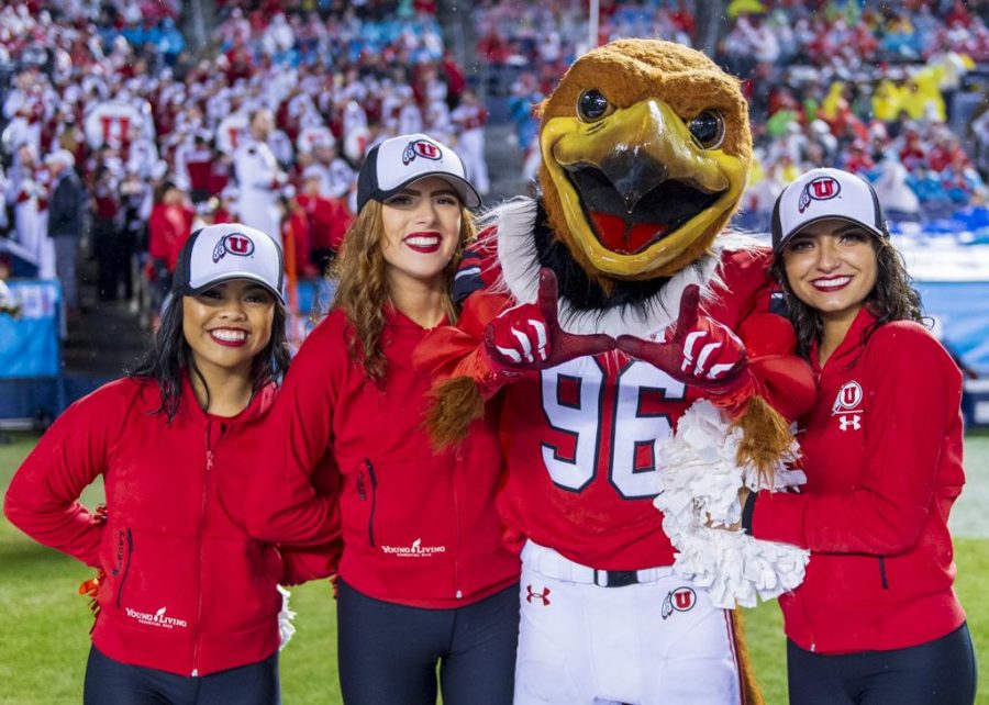 Swoop, The University of Utah mascot poses with the dance team during the San Diego County Credit Union Holiday Bowl vs. Northwestern University at SDCCU Stadium in San Diego, California on Monday, Dec. 31, 2018. (Photo by Kiffer Creveling | The Daily Utah Chronicle)