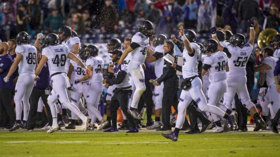 Northwestern University celebrates after scoring a touchdown during the San Diego County Credit Union Holiday Bowl vs. The University of Utah at SDCCU Stadium in San Diego, California on Monday, Dec. 31, 2018. (Photo by Kiffer Creveling | The Daily Utah Chronicle)