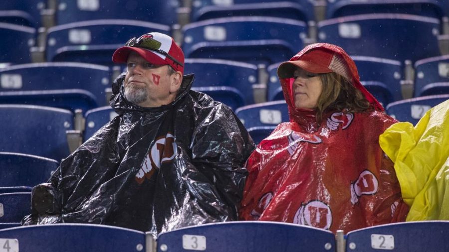 University of Utah fans watch the game during a rainstorm before the end of the game during the San Diego County Credit Union Holiday Bowl vs. Northwestern University at SDCCU Stadium in San Diego, California on Monday, Dec. 31, 2018. (Photo by Kiffer Creveling | The Daily Utah Chronicle)