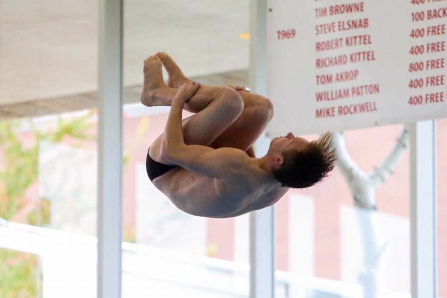Daniel Therlaut mid-dive as the Utah Men and Womens Swim and Dive Team take on the Stanford Cardinals at the Ute Natatorium in Salt Lake City, UT on Friday, Oct. 20, 2017.

(Photo by Curtis Lin/ Daily Utah Chronicle)