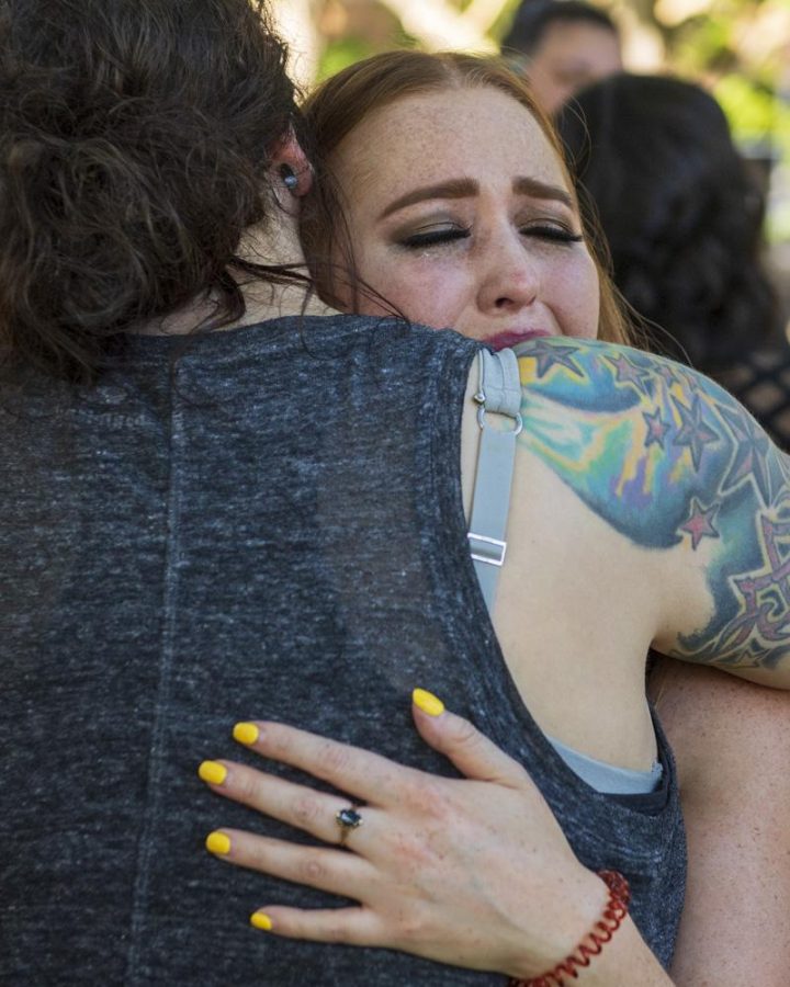 Students, staff and friends attend a vigil in remembrance of MacKenzie Lueck at the University of Utah Student Union lawn in Salt Lake City, UT on Monday, July 1, 2019. (Photo by Kiffer Creveling | The Daily Utah Chronicle)