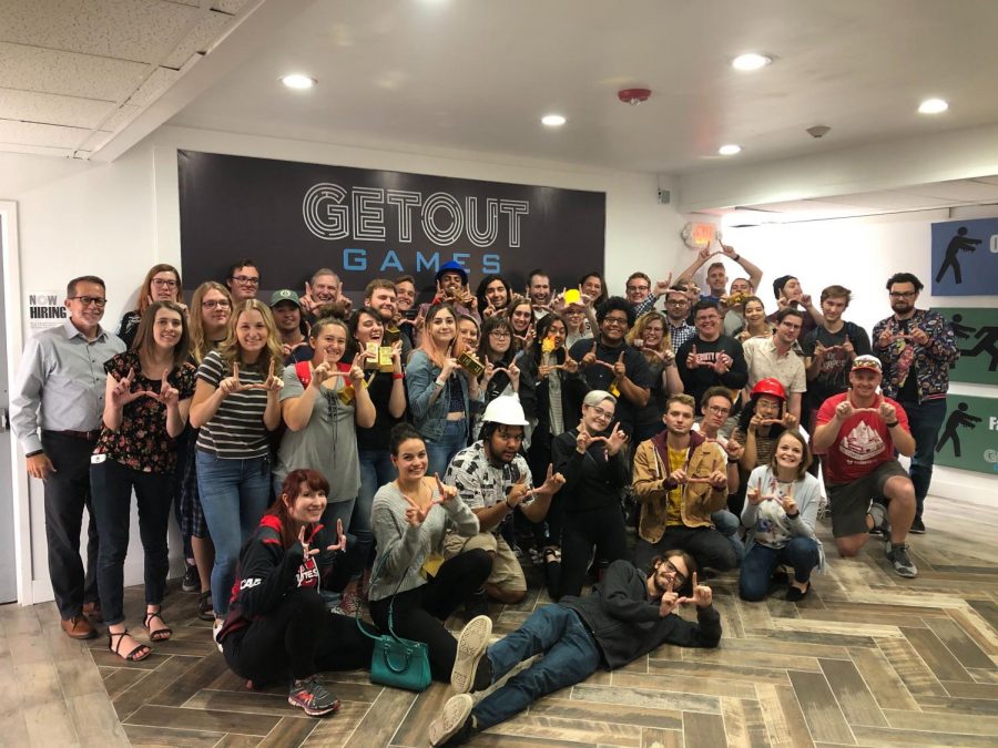 The Student Media crew flashes the U after a series of escapes. (Courtesy Get Out Games)