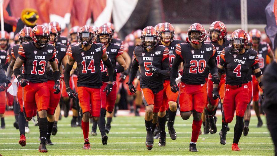 The University of Utah Football team charge onto the field in an NCAA Football game vs. Arizona State University at Rice-Eccles Stadium in Salt Lake City, UT on Saturday October 19, 2019.(Photo by Curtis Lin | Daily Utah Chronicle)
