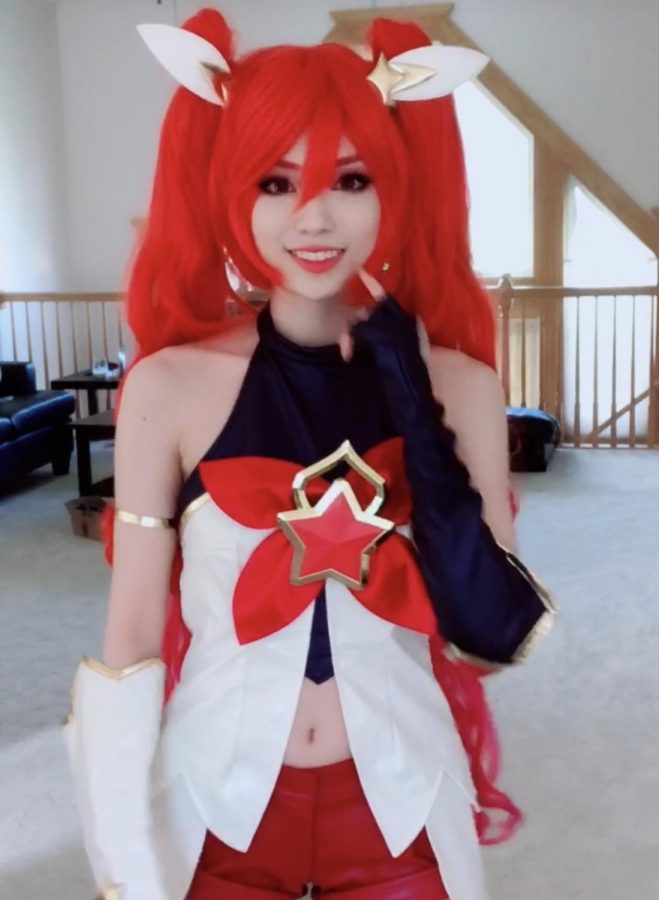 Riot Games partner Emiru cosplaying as one of her favorite League of Legends characters, Jinx in a Star Guardian skin.