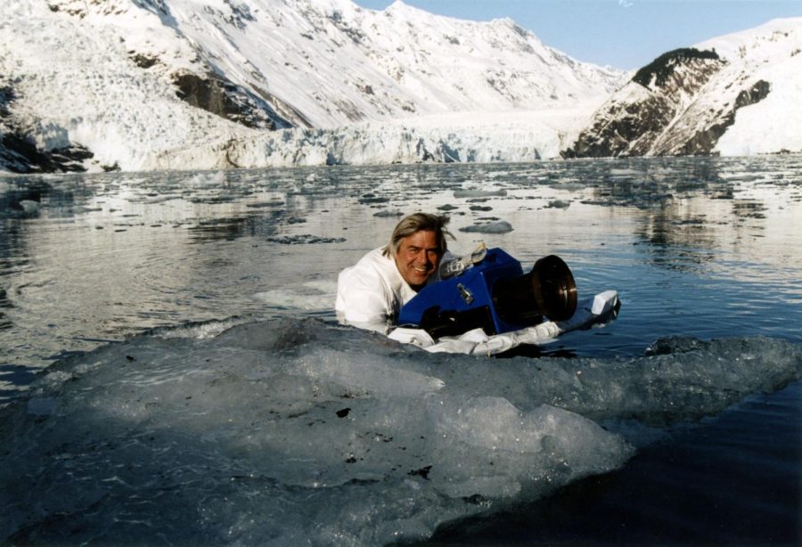 Mike deGruy’s white camouflage in icy Alaska helped calm skittish sea otters long enough for a filming session. (Circa: 2005) (Courtesy of Alison Hill)